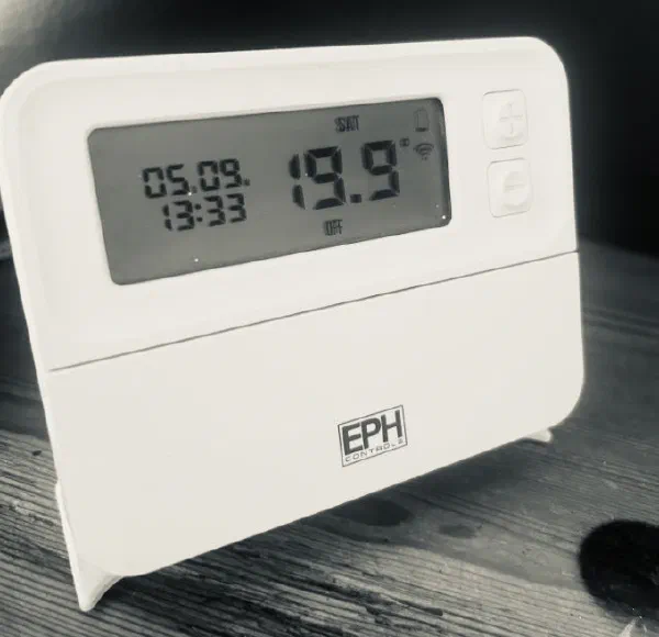 EPH Controls wireless programmable room thermostat displaying the current room temperature